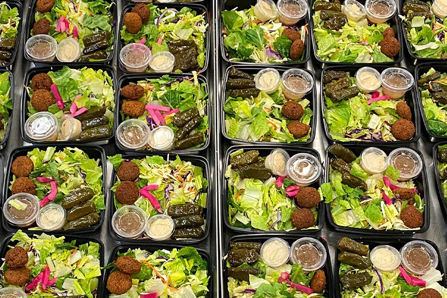 Rows of Chicken Maison Catering Salads in a Boxed STyle
